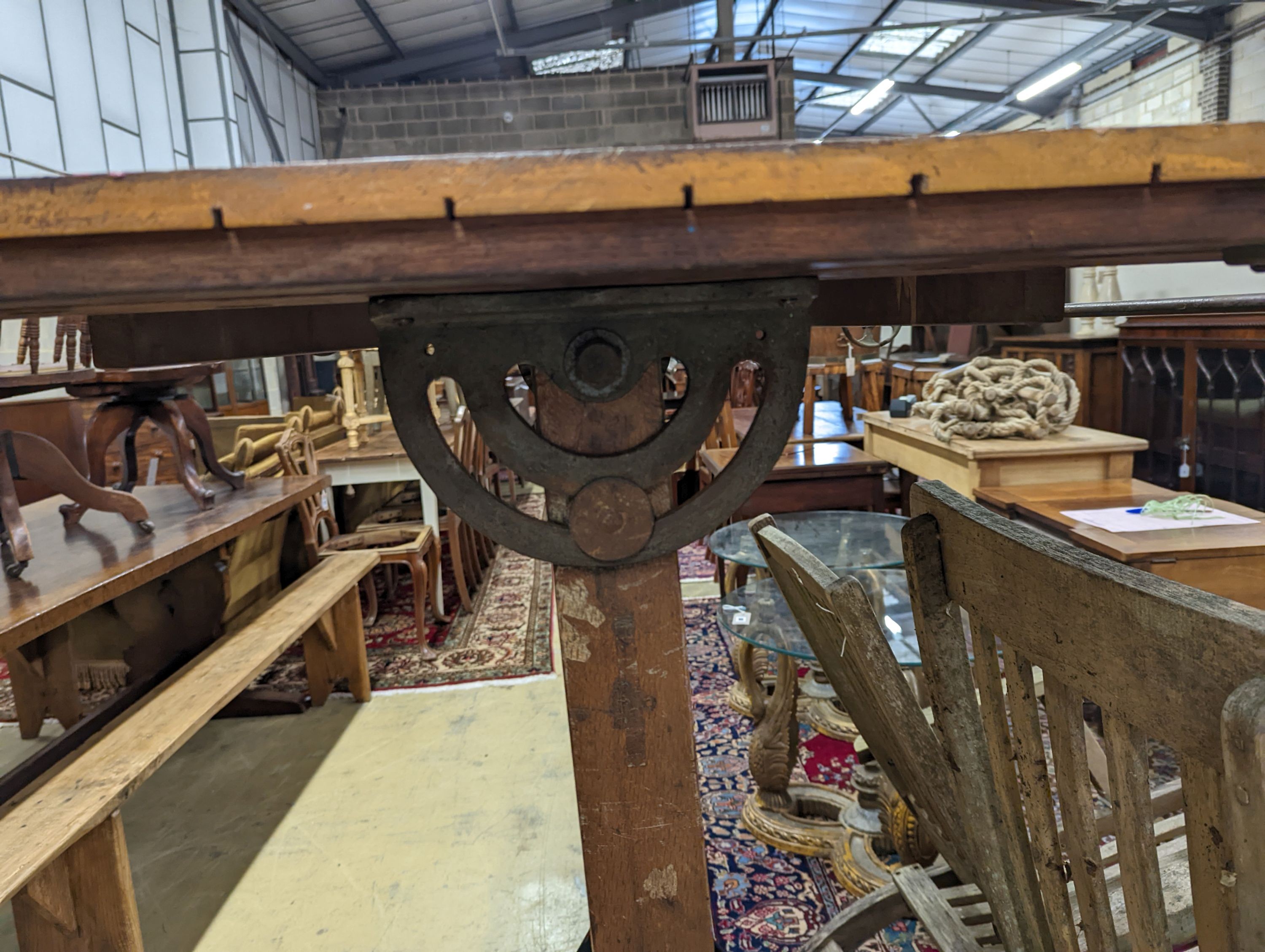 A vintage pine and cast iron draughtsman table, by R J Hall and co-Ltd Westminster W-116cm, D-95cm, H-127cm. (Table flat)